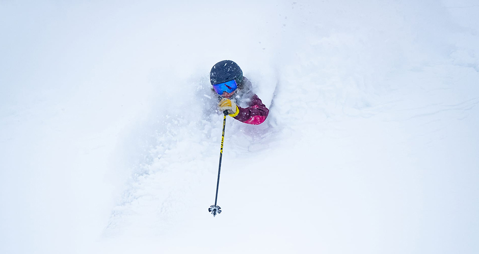Ski Rachael Burks gets deep on a powder day. Photo: Iz La Motte, Alta Ski Resort