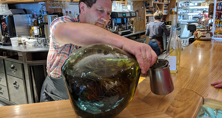 Locally made genepi being served in a mountain restaurant. Photo: Scout