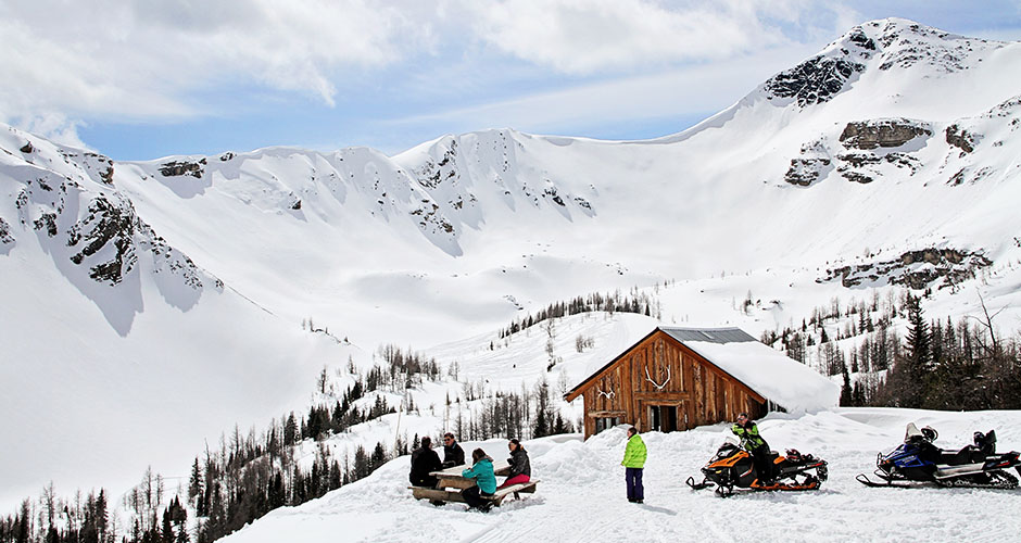 Snowmobiling up into the mountains. Photo: Panorama Mountain Resort