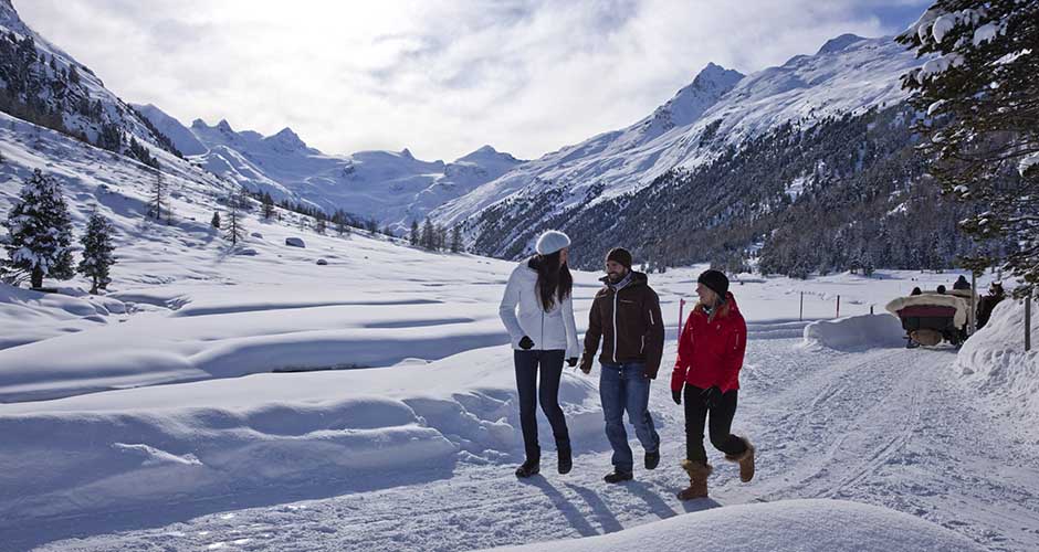 Winter walking is a popular side activity. Photo: St Moritz Engadin tourism