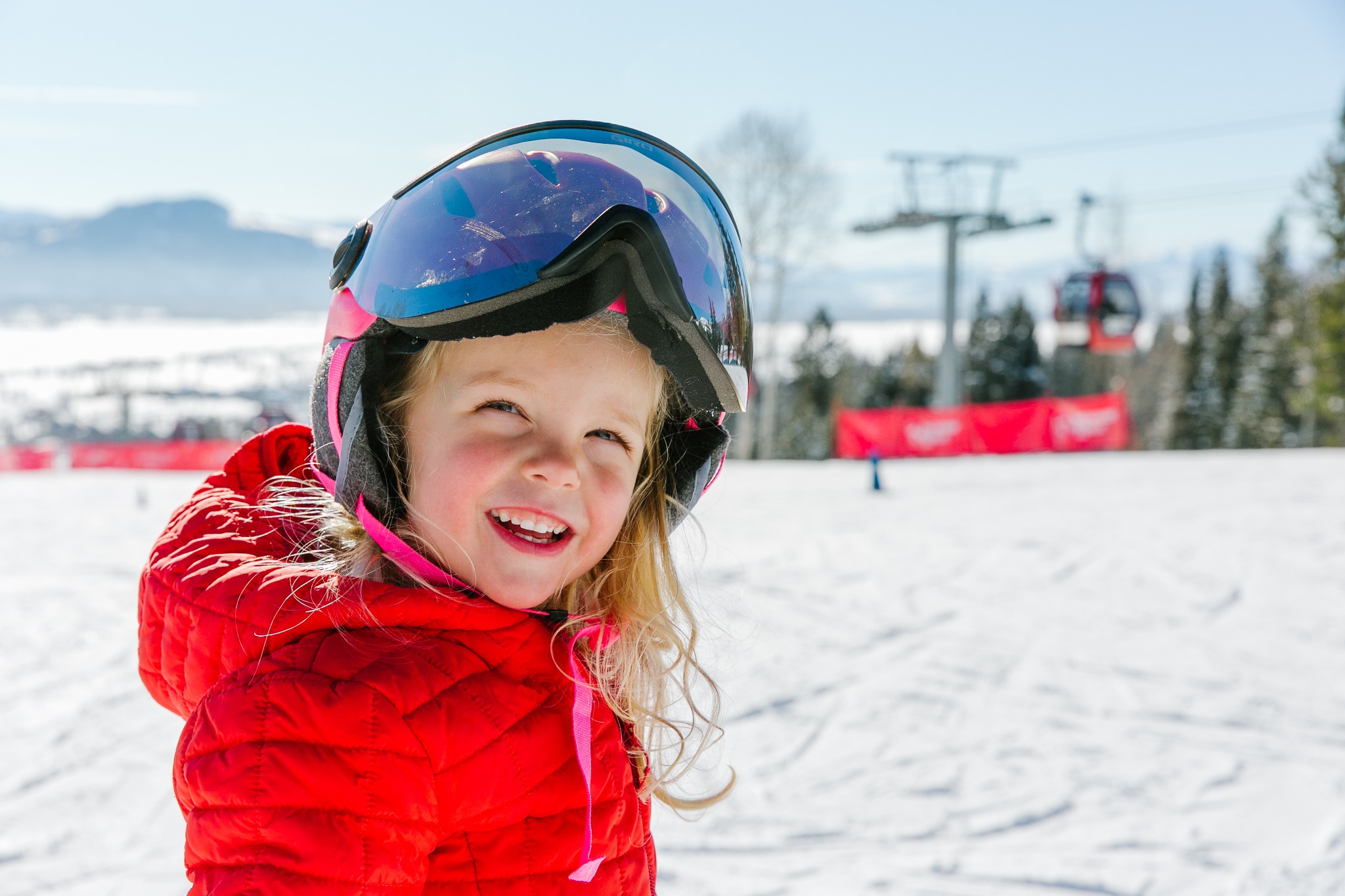 A young skier enjoying a family ski holiday at Jackson Hole